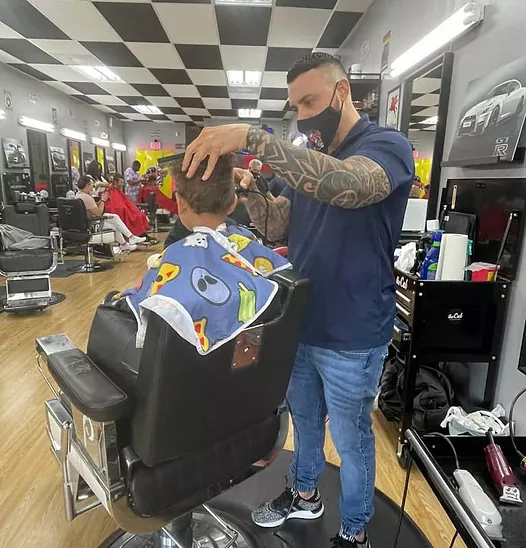 uptown_barbershop logo